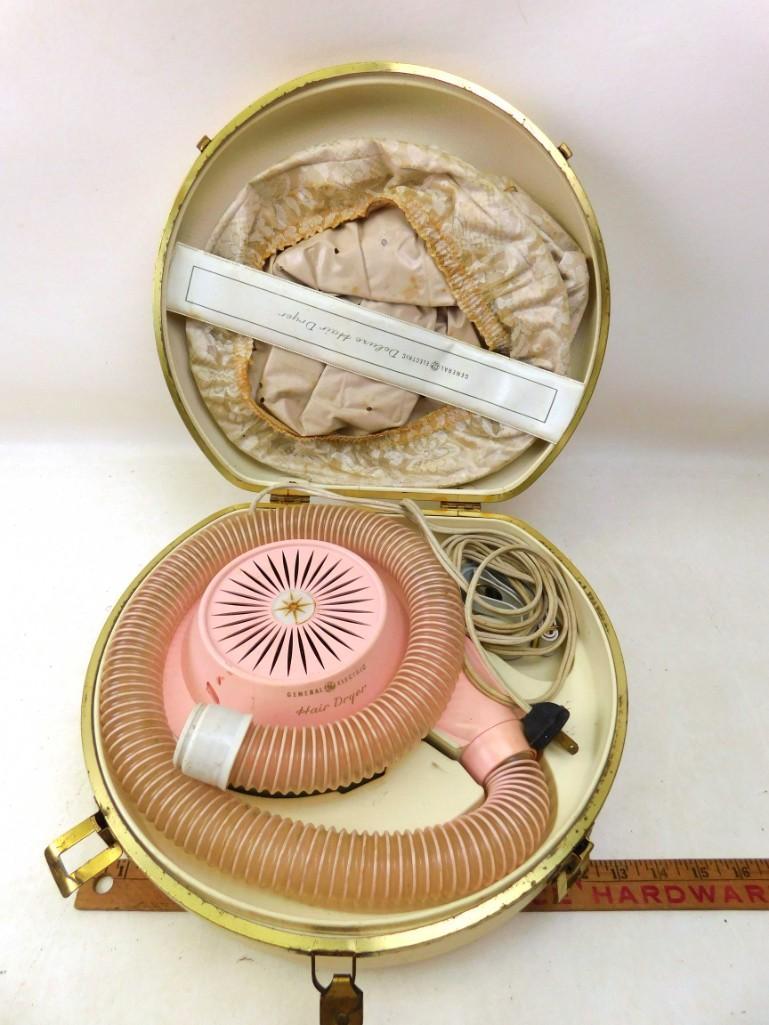 Vintage Pink GE Hair Dryer Bonnet Dryer: Vintage Pink General Electric Hair Dryer Bonnet Dryer This turns on and heats up when plugged in. Comes with the case. No need to go to the salon to get your hair dried and risk covid, you could do th