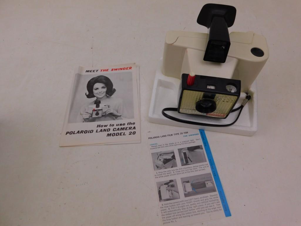 Vintage Polaroid Swinger Land Camera Model 20 with Box: Vintage Polaroid Swinger Land Camera Model 20 with Box and Manuals I think I know why they called it the Swinger Camera - no need to take the film to the photo hut to get it developed... Untested as t