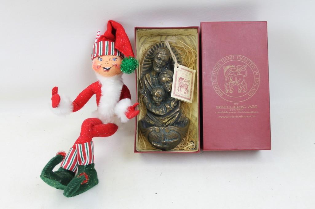 Annalee Elf and a Bronze Finish Religious Wall Hanging: Annalee Christmas Elf and a Bronze Finish Religious Wall Hanging by Irish Celtic Art Studio of Mary , Joseph , and Baby Jesus . New in box