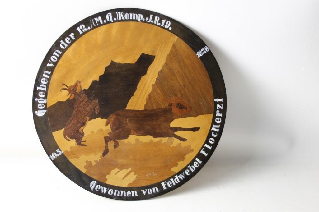 Pre WWII German Machine Gun Target Trophy: Pre World War II German Machine Gun Target Trophy Given to Seargent Flockerzi 10-5-1928 Made of Inlaid Wood with 2 deer and mountains Roughly 17.75" diameter