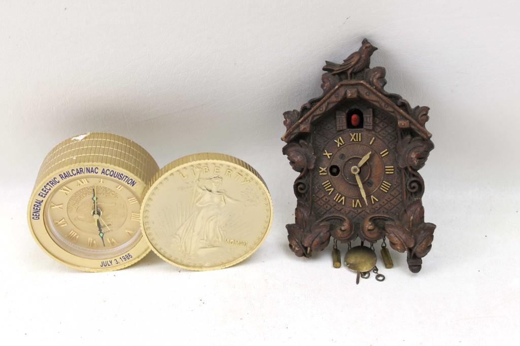 Bulova General Electric Railcar Clock and a Cuckoo: Bulova General Electric Railcar Advertising Clock in the shape of a coin and a Cuckoo Clock