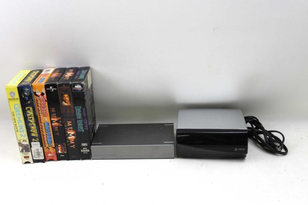 VHS Horror Movies, and Denon Heos System: VHS Horror Movies, and Denon Heos System, Lacie Hard drive Includes Tales From the Crypt, The Mummy, Godzilla and Mothra, Creeepshow 2, Gremlins 2
