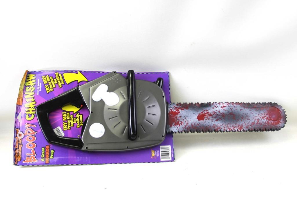 Halloween Bloody Chainsaw Horror Prop: Halloween Bloody Chainsaw Horror Prop . Would be great for a haunted house . New with original packaging