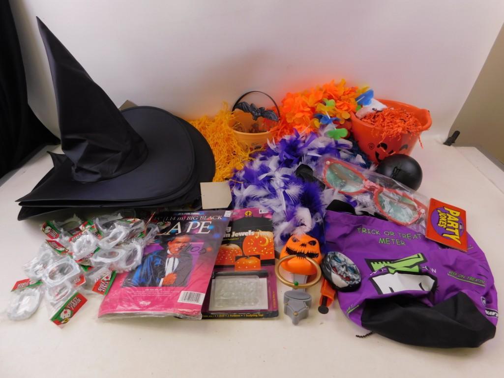 Halloween Lot - lots of goodies!: Halloween Lot - lots of goodies! Includes 4 Witches hats, candy bags and buckets, lots of scary fang teeth, a cape, a Halloween door knocker, a pumpkin decorating kit with jewels, Halloween pom poms, 