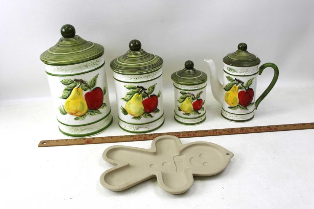 Set of Canisters and a Teapot and a Gingerbread Cookie: Set of Canisters and a Teapot with a Fruit Design and a Gingerbread Cookie Mold