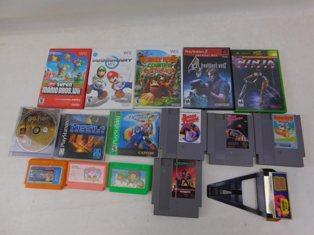 Video Game Lot including Wii, NES, PlayStation / PS2,: Video Game Lot including Wii, NES, PlayStation / PS2, XBox etc. For Nintendo NES includes:Game Genie for NES, Gauntlet, Bases Loaded, Star Voyager, Super Team Games For Wii: Super Mario Bros. Wii, Mar