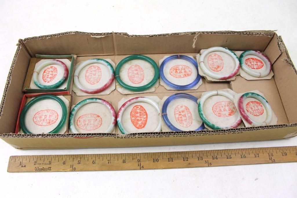Lot of 12 Vintage Peking Glass Bangle Bracelets: Lot of 12 Vintage Peking Glass Bangle Bracelets including blue ones , green ones , and multi colored green-red-off-white ones . Various sizes
