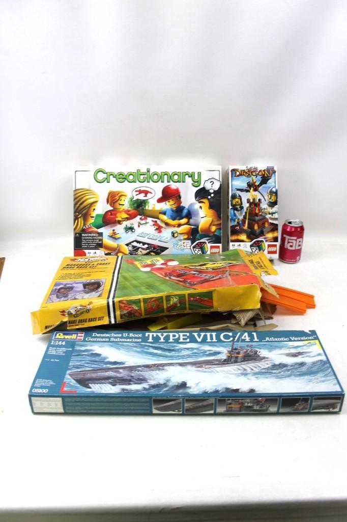 Toy Lot inc Lego Lava Dragon , Lego Creationary ,: Toy Lot inc Lego Lava Dragon , Lego Creationary , Revell German U-Boot Submarine Model 1:144 Scale , and a Hot Wheel Set Condition: Hot Wheels set is incomplete. Other sets are unchec