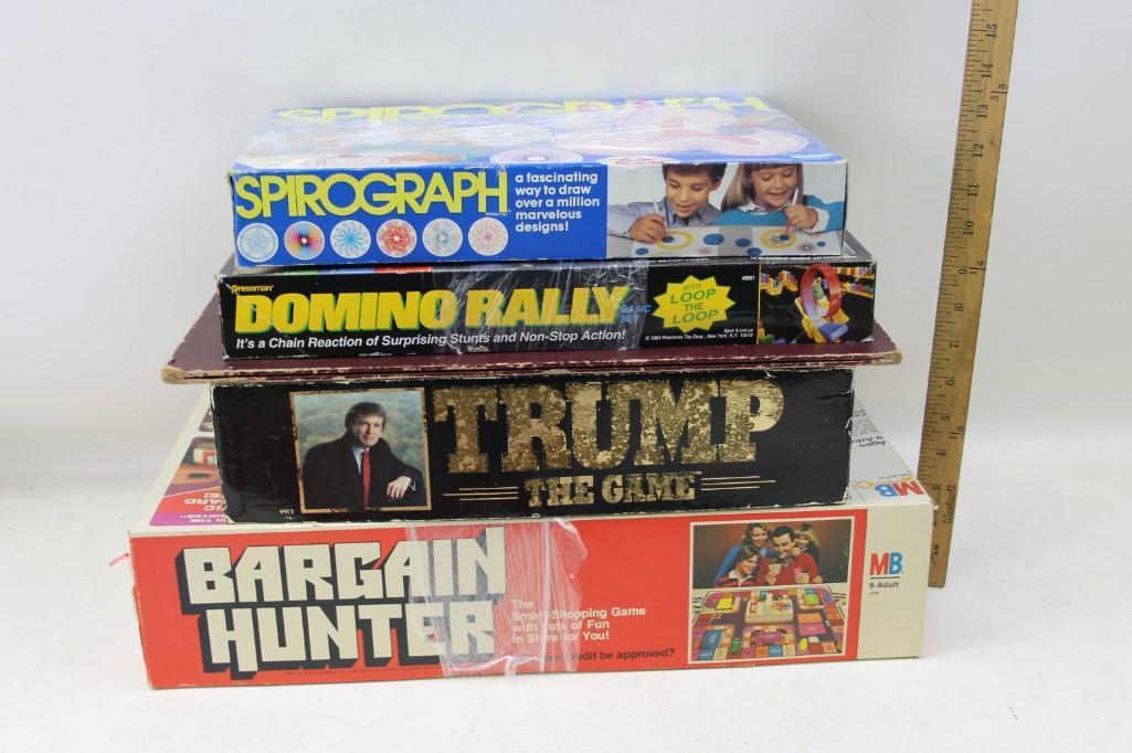 Lot of Board Games and Other Games: Lot of Board Games and Other Games Includes Donald Trump - The Game The Domino Rally with the Loop the Loop, Spirograph and Bargain Hunter, also includes a Camelot Game Board with a 1930 copyright