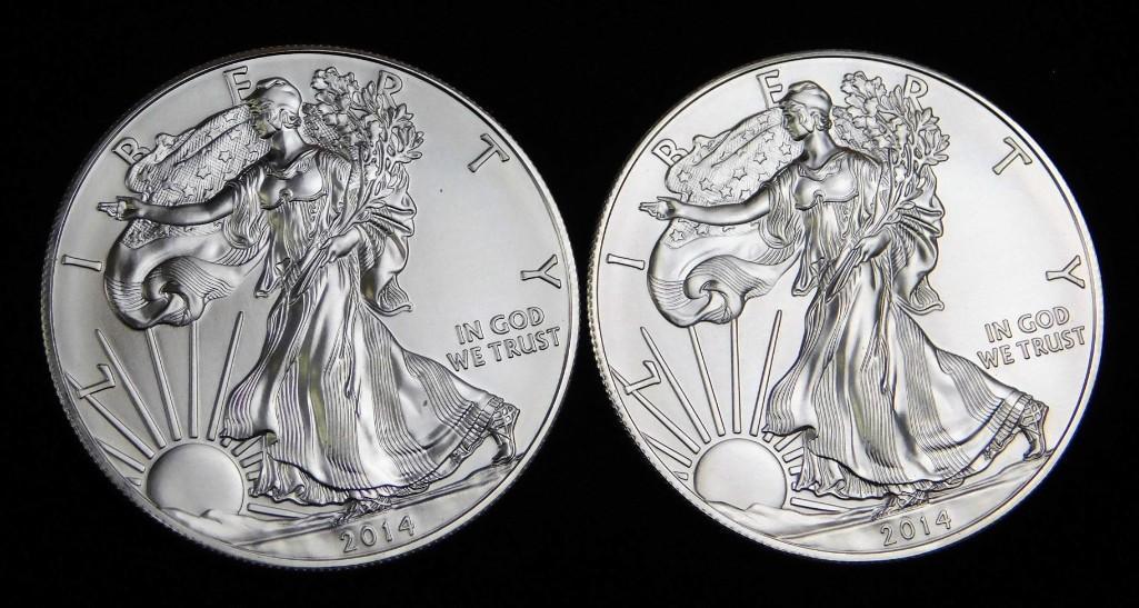 2 BU 2014 American Silver Eagle Dollar Coins: 2 Brilliant Uncirculated 2014 American Silver Eagle Dollar Coins . Each one is 1 ounce of fine silver for a total of 2 ounces