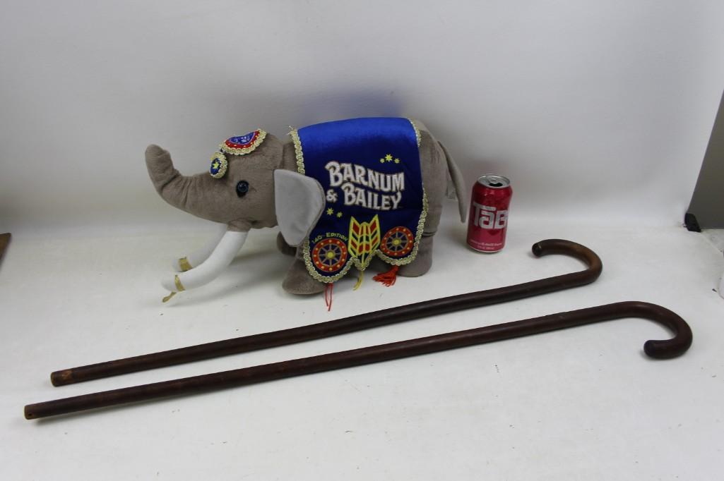 Ringling Brothers Barnum & Bailey Plush Elephant and: Ringling Brothers Barnum & Bailey Plush Elephant from 2001 (140th edition) and two wooden walking canes one of them is engraved World's Fair 1933 Hall of Science Century of Progress