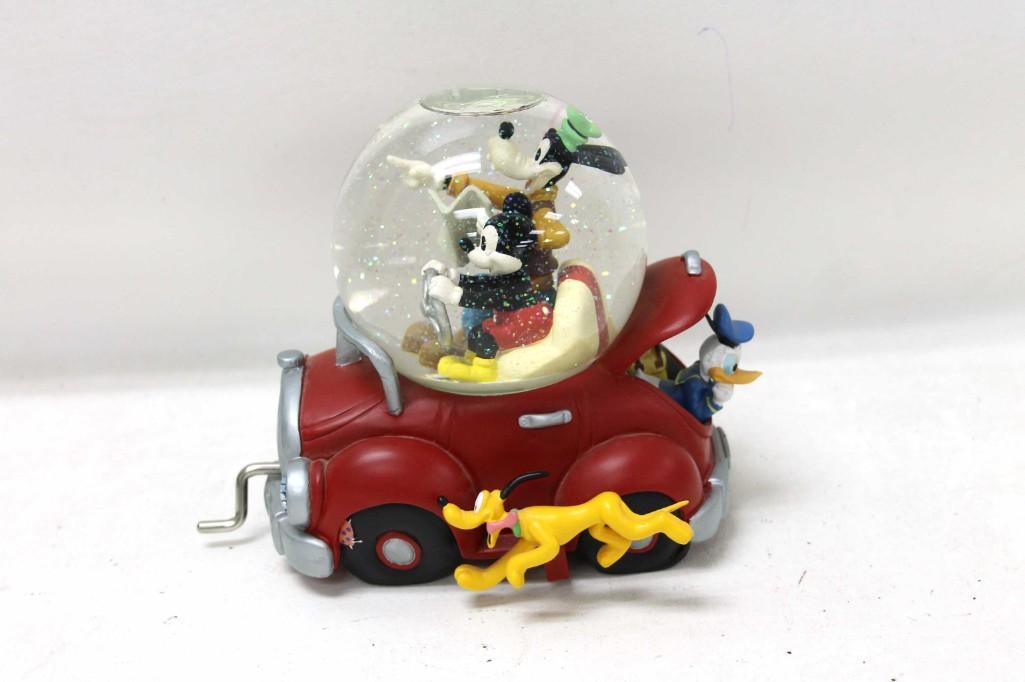 Disney Music Box Mickey Mouse and Goofy Snow Globe Car: Disney Music Box Mickey Mouse and Goofy Snow Globe Car Features Pluto chasing the car and Donald Duck in the trunk Plays Zippeddy Do Da