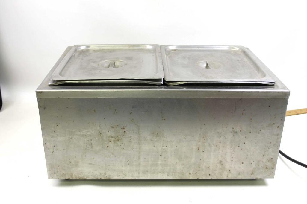 APW Wyott Full Size Steam Table: APW Wyott Full Size Steam Table This holds a full size or two half pans or three third pans, etc. It looks like it comes with two half pans. It turns on and heats up. This is perfect for y