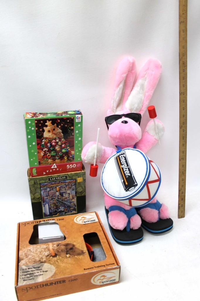 Lot of Misc incl Energizer Bunny , 2 Puzzles , Dog: Lot of Misc incl Energizer Bunny , 2 Puzzles , Dog Training System Condition: Puzzles not checked for completeness and dog training system and Energizer bunny untested