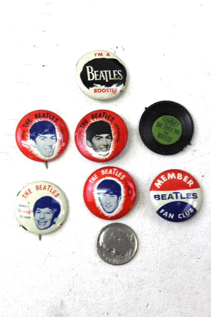7 The Beatles Buttons: Lot of 7 The Beatles Pin Back Buttons . Includes Member Beatles Fan Club , John Lennon , Ringo Star , 2 George Harrison , She Loves You , I'm a Beatles Booster