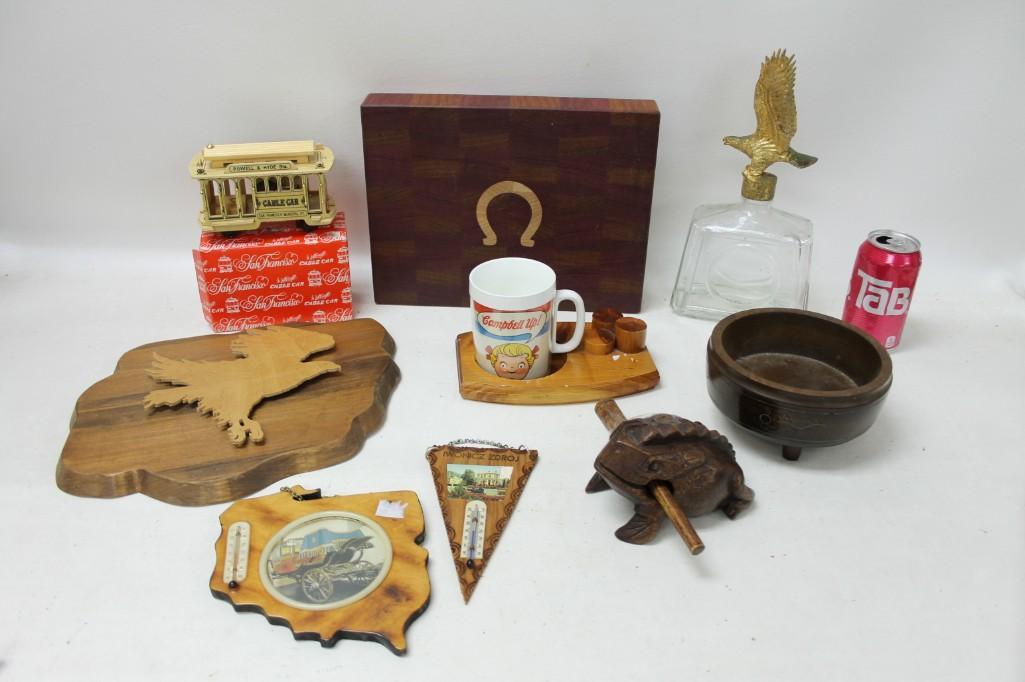 Misc Lot full of goodies: Misc Lot full of goodies including a musical frog guiro, Campbell's Soup Mug, Thermometer wall hangings, Eagles, Cable Car Model, a very heavy wood cutting board with a horseshoe, etc.