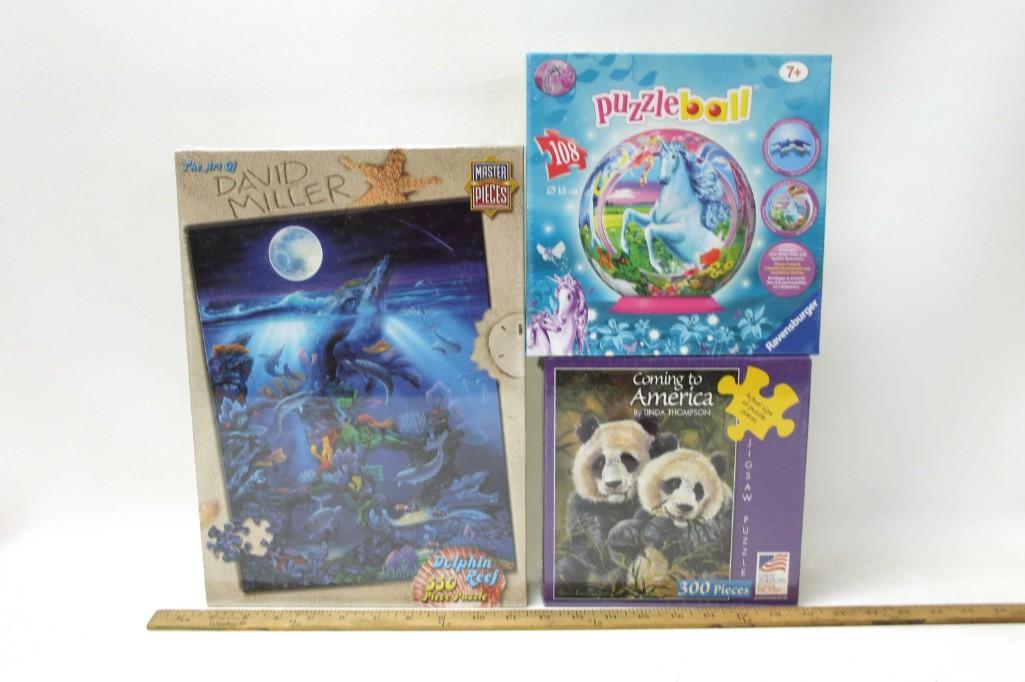 Lot of 3 New Jigsaw Puzzles incl David Miller ,: Lot of 3 New Jigsaw Puzzles incl David Miller , Puzzleball , Coming to America All are new and sealed