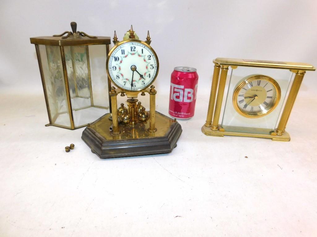 2 Vintage Clocks - Non-Working: 2 vintage project clocks. Neither one works . The Howard Miller clock has a cracked face , as you can see in the 4th picture Condition: Neither one works, the Howard Miller has a cra