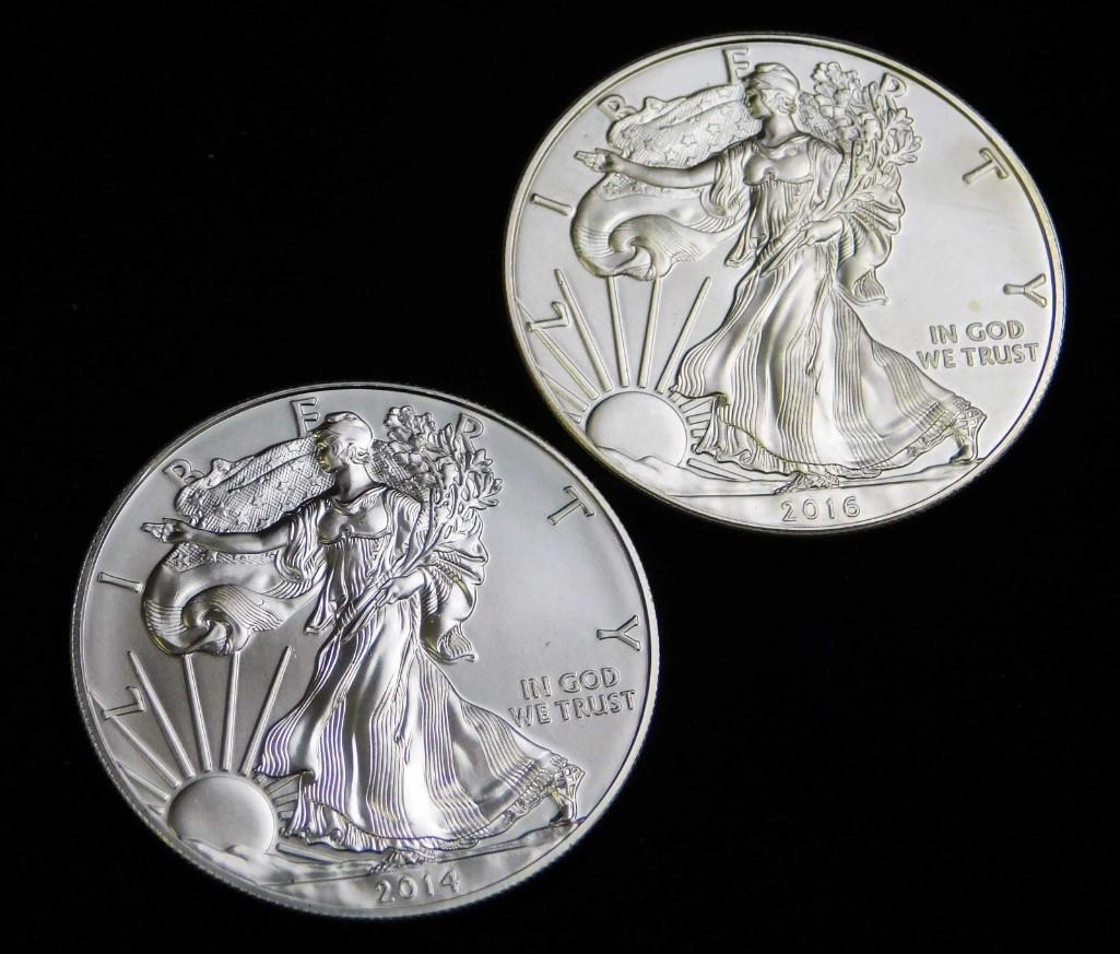 2 BU American Silver Eagles 2014 & 2016 Silver Rounds: 2 Brilliant Uncirculated American Silver Eagles 2014 & 2016 . Each are 1 ounce of fine silver for a total of 2 ounces