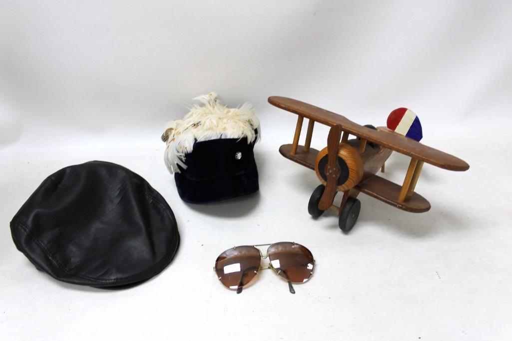Vintage Lot incl Hats , Sunglasses , and a Wood Model: Vintage Lot incl Leather Driving Cabbie Hat , Hat with Feathers , Sunglasses , and a Wood Model Airplane