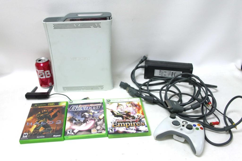 Xbox 360 Lot including Console and Games, etc.: Xbox 360 Lot including Console and Games, etc. Includes Halo 2, Dynasty Warriors Gundam, and Dynasty Warriors 5 Empires, plus a controller and a bunch of cords.