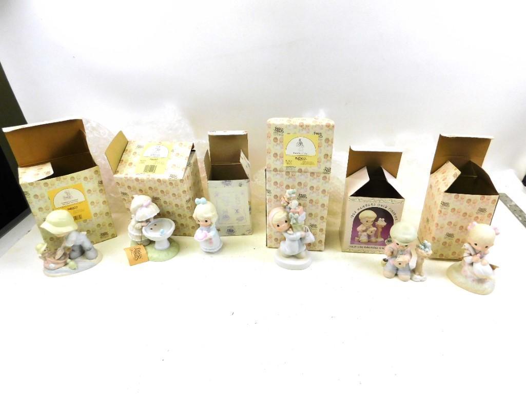Lot of Enesco Precious Moments Figurines: Lot of Enesco Precious Moments Figurines with Boxes B Lot Includes Nothing can dampen the spirit of caring, A reflection of his love, Bundles of joy, Only love can make a home (1992 members only figur