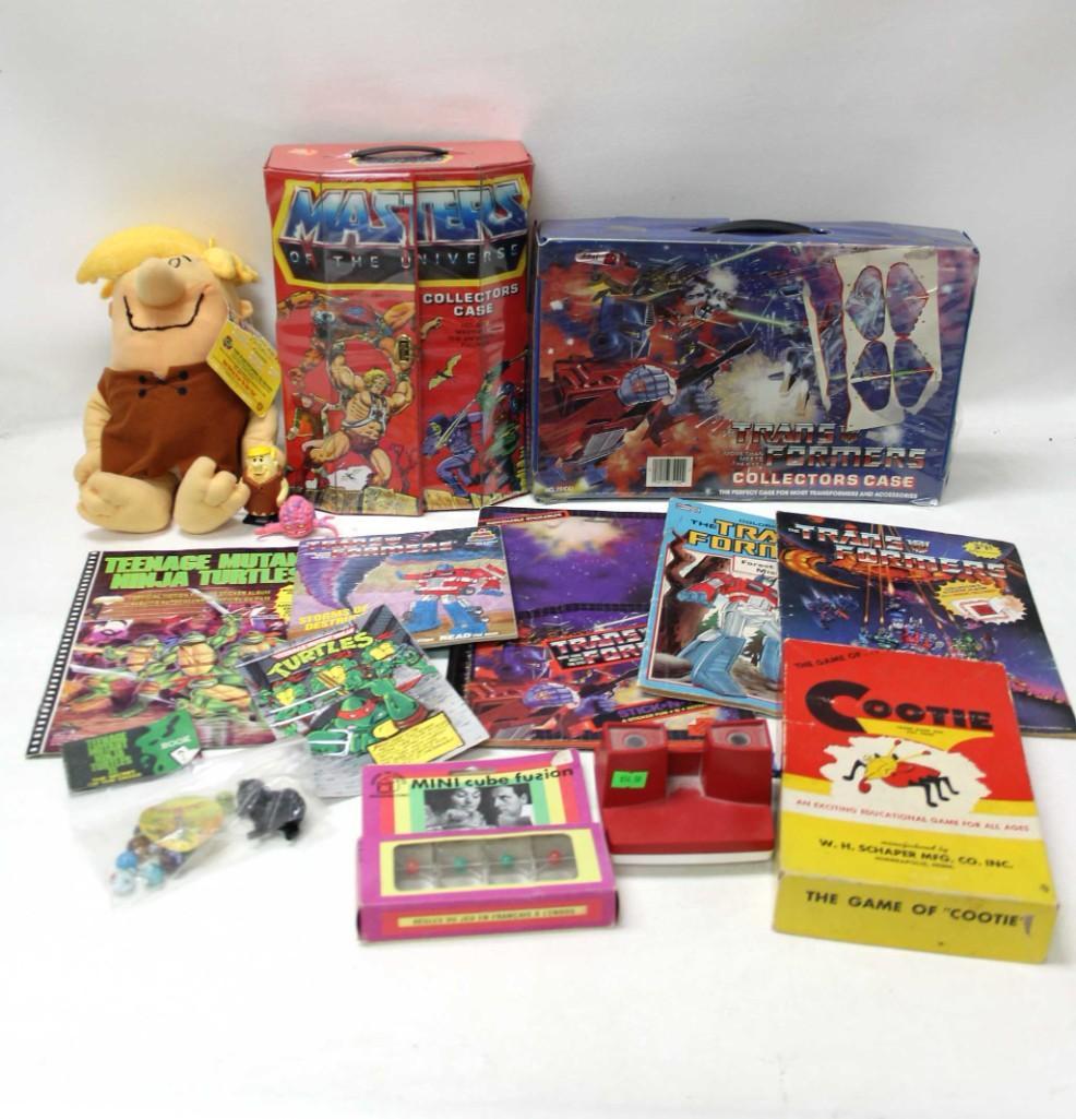 Vintage Toy Lot incl Masters of the Universe Case ,: Vintage Toy Lot incl Masters of the Universe Case , Transformers Case , Cootie Game , View Master , Mini Cube Fusion , Plush Barney Rubble , Books , etc