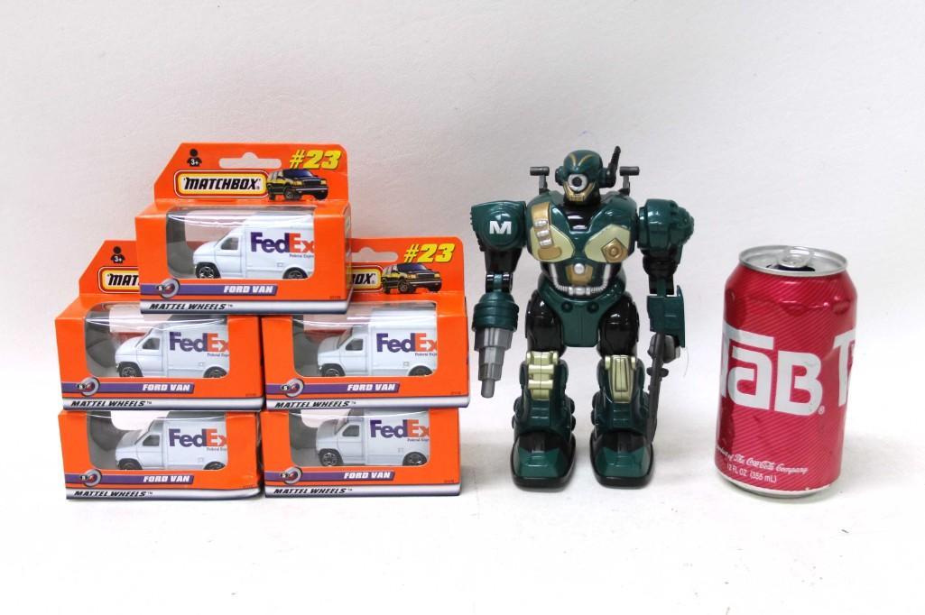 Lot of Matchbox Fed Ex Trucks and a Robot Action Figure: Lot of Matchbox Mattel Wheels Fed Ex Trucks New in Box and a Robot Action Figure