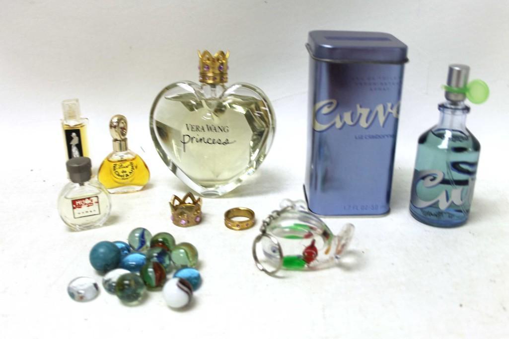 Lot of Perfume or Cologne Bottles and Smalls: Lot of Perfume or Cologne Bottles and Smalls including marbles and rings Condition: You are buying these for the bottles, no guarantees as to the quality or quantity of what's inside