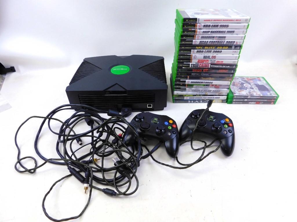 Microsoft XBox plus XBox Games and XBox One games: Microsoft XBox plus XBox Games and XBox One games Includes some cords and two controllers. Games include: World Series Baseball, NBA Live, MVP Baseball, Madden, NCAA Football, NFL Blitz, NBA Liv