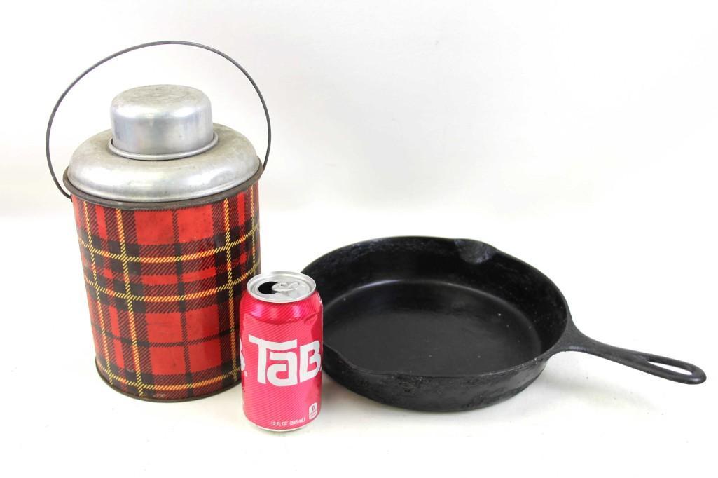 Griswold Cast Iron Skillet or Frying Pan No 8 and a: Vintage Griswold Cast Iron Skillet or Frying Pan No 8 and a Plaid Thermos . Thermos is rusted through on the bottom Condition: Thermos is rusted through on the bottom