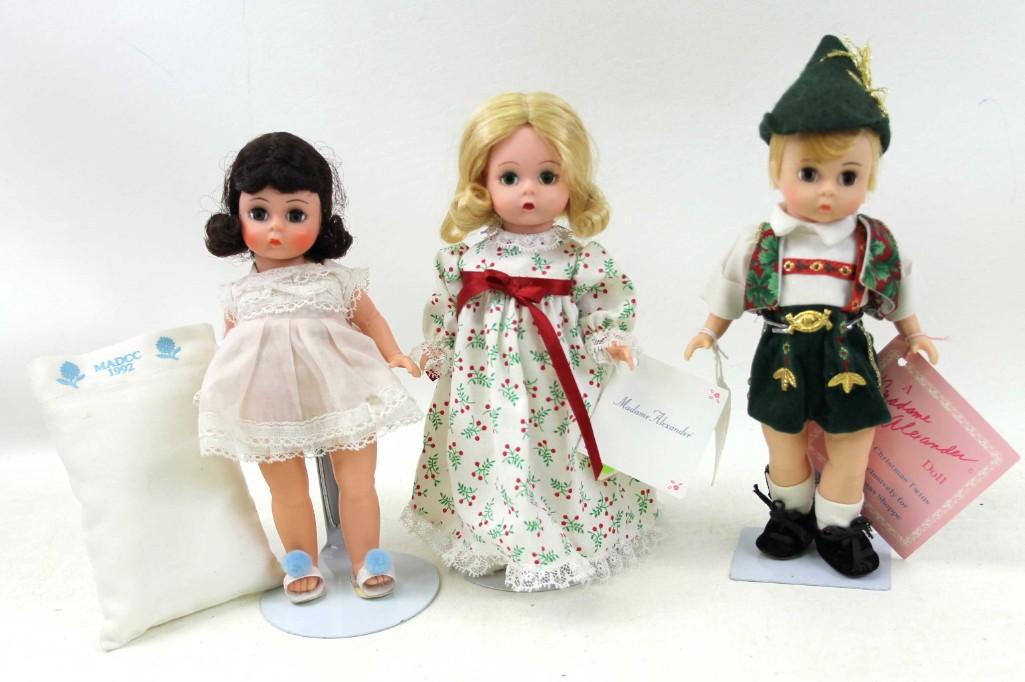 3 Madame Alexander Dolls incl Christmas Morning ,: Lot of 3 MA Dolls including Madame Alexander Christmas Morning 8" doll with stand, missing 1 slipper , Madame Alexander Alpine Christmas Twins Boy Only 8" Doll made exclusively for Christmas Shoppe wi