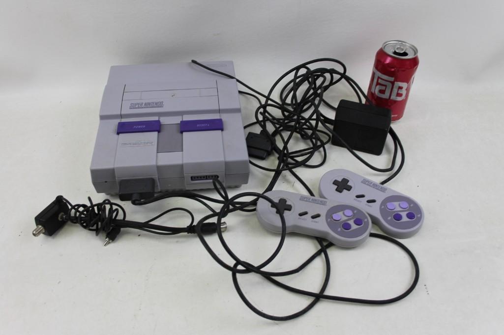 Super Nintendo Lot including power cord, 2 controllers,: Super Nintendo Lot including power cord, 2 controllers, adapter cord Untested