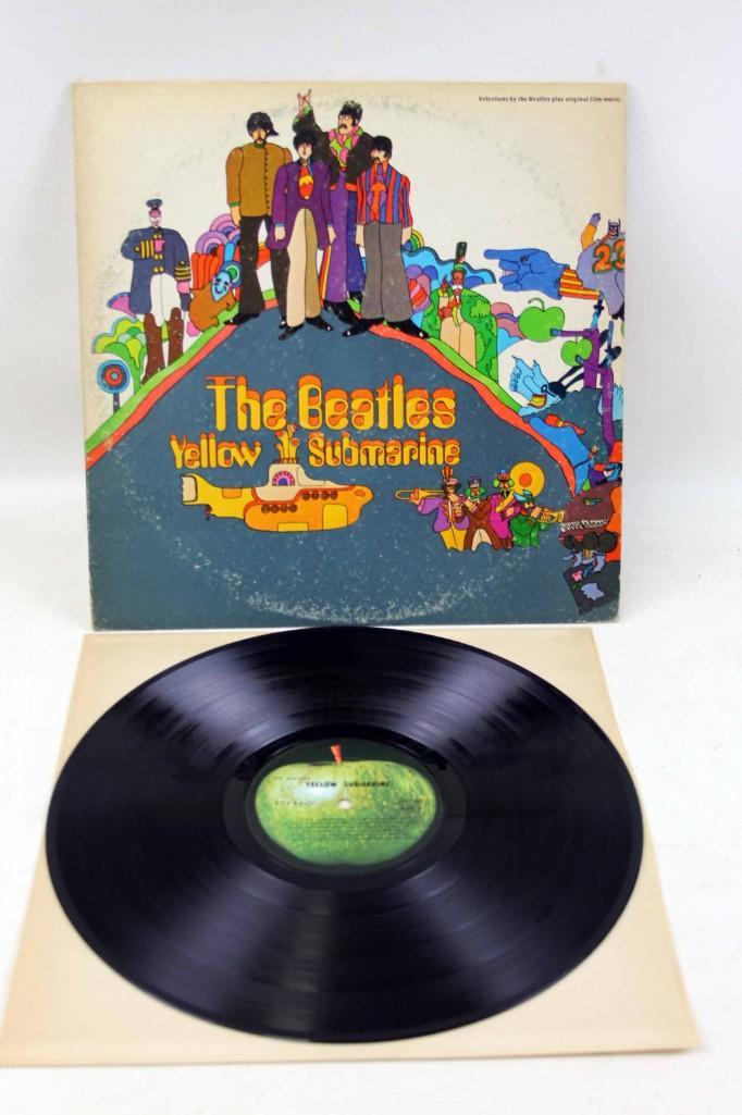 The Beatles Yellow Submarine Vinyl LP Record: The Beatles Yellow Submarine Vinyl LP Record Record is in good Shape 