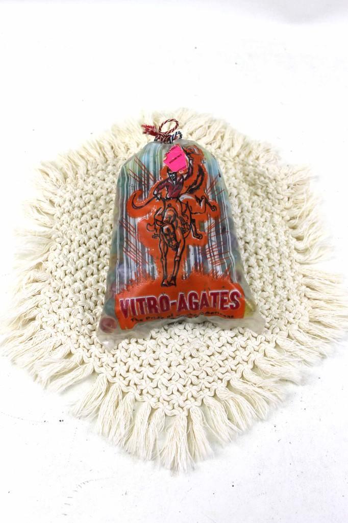 Bag of Marbles and a Doily: Bag of Marbles and a Doily Condition: These marbles are in a Vitro Agates bag, but the look to be of various brands and/or styles