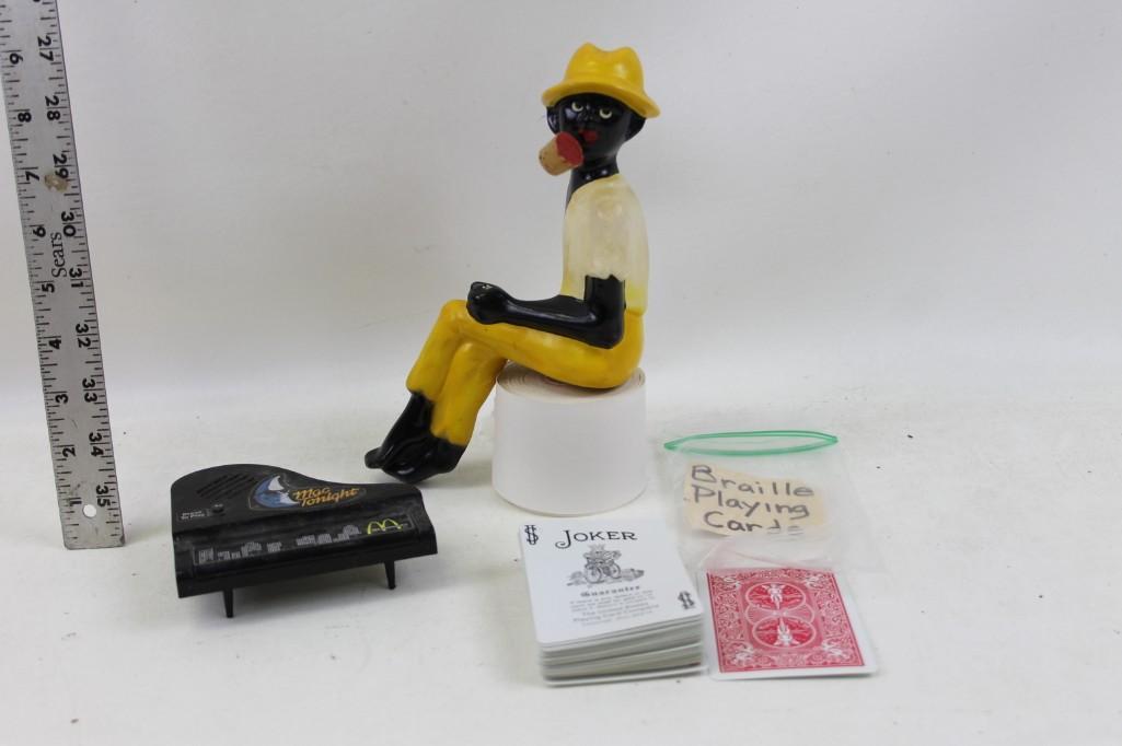 Misc. Lot Braille Playing Cars, Black Americana Figure,: Misc. Lot Braille Playing Cars, Black Americana Figurine, Mac Tonight McDonalds Piano Toy Paper roll not included - just to prop up the figurine