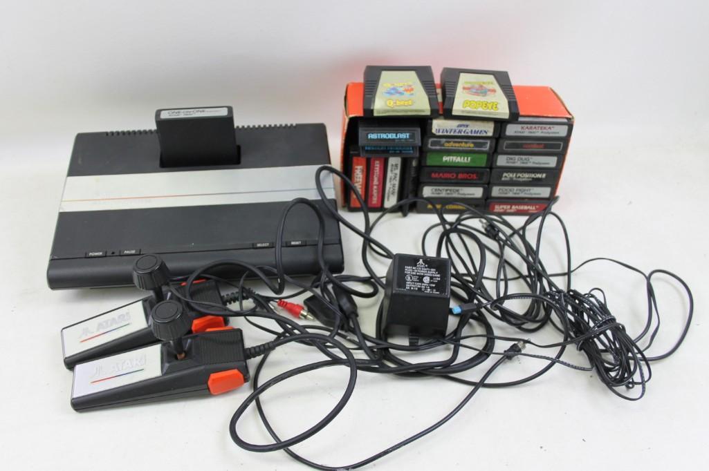 Atari 7800 system plus games, cords and controllers,: Atari 7800 system plus games, cords and controllers, etc. This will play both Atari 2600 and 7800 games. Includes the following Games: Q*Bert, Popeye, Astroblast, Armor Ambush, Freeway, Keystone Kaper