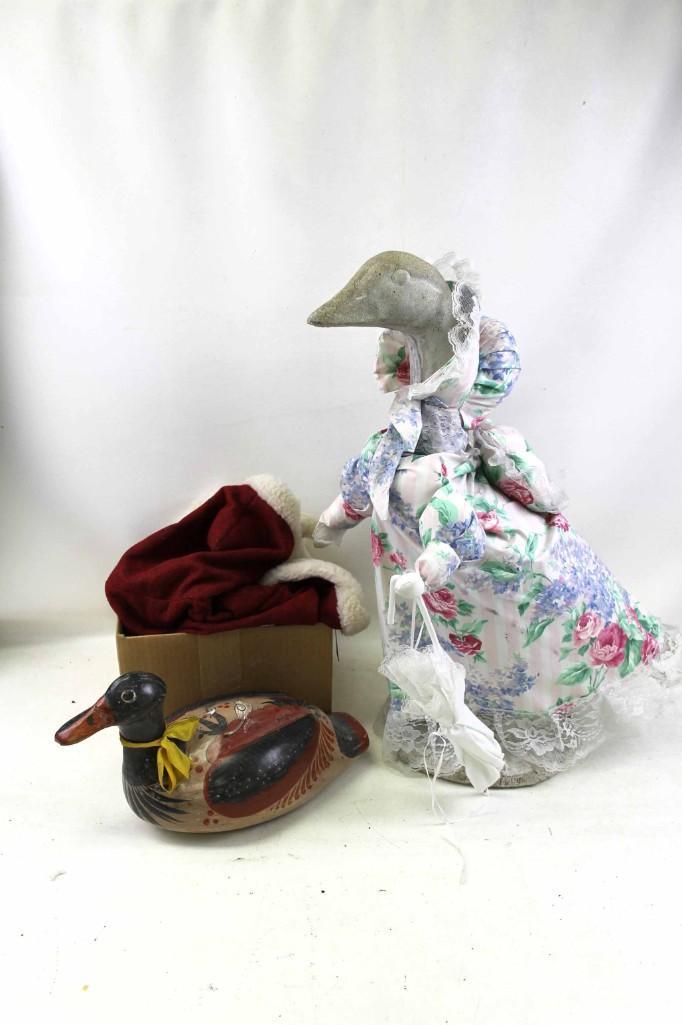 Concrete Goose and Wooden Duck: Concrete Goose and Wooden Duck , Both have damage . This goose is very HEAVY. I would recommend pick up only, but if you are planning to have UPS ship it, it will be expensive because of t