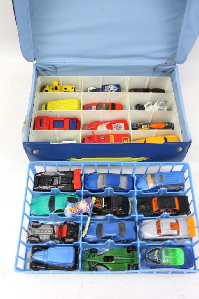 Hot Wheels Cars and Vehicles in a Matchbox Case: Hot Wheels Cars and Vehicles in a Matchbox Case Condition: Please see all pictures. Cars are in played with condition and case has a few tears to the vinyl