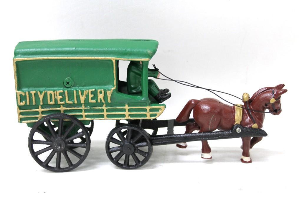 Cast Iron Toy City Delivery Horse and Buggy: Reproduction Cast Iron Toy City Delivery Horse and Buggy Condition: This is a newer reproduction . Made in China