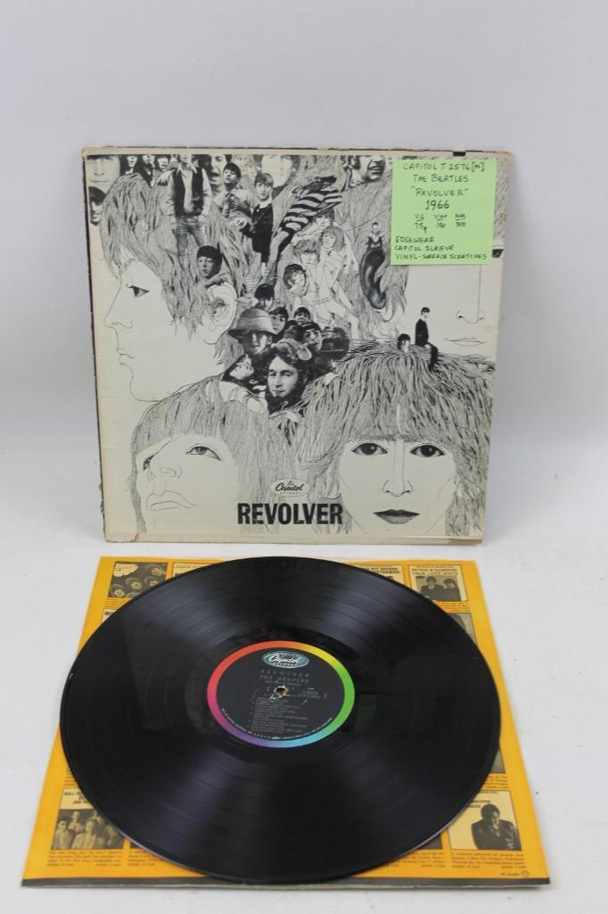 The Beatles Revolver Vinyl LP Record Album: The Beatles Revolver Vinyl LP Record Album. Bottom of the album cover has a split - see pictures LOT P