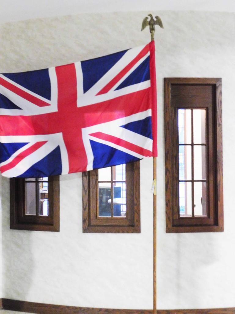Flag of Great Britain (brass eagle top): Flag of Great Britain (brass eagle top) 8'x6" Because of the current covid 19 situation, pick up times are by appointment only. Pick up for this auction will be Feb 27 and 28 during the auction or Mon