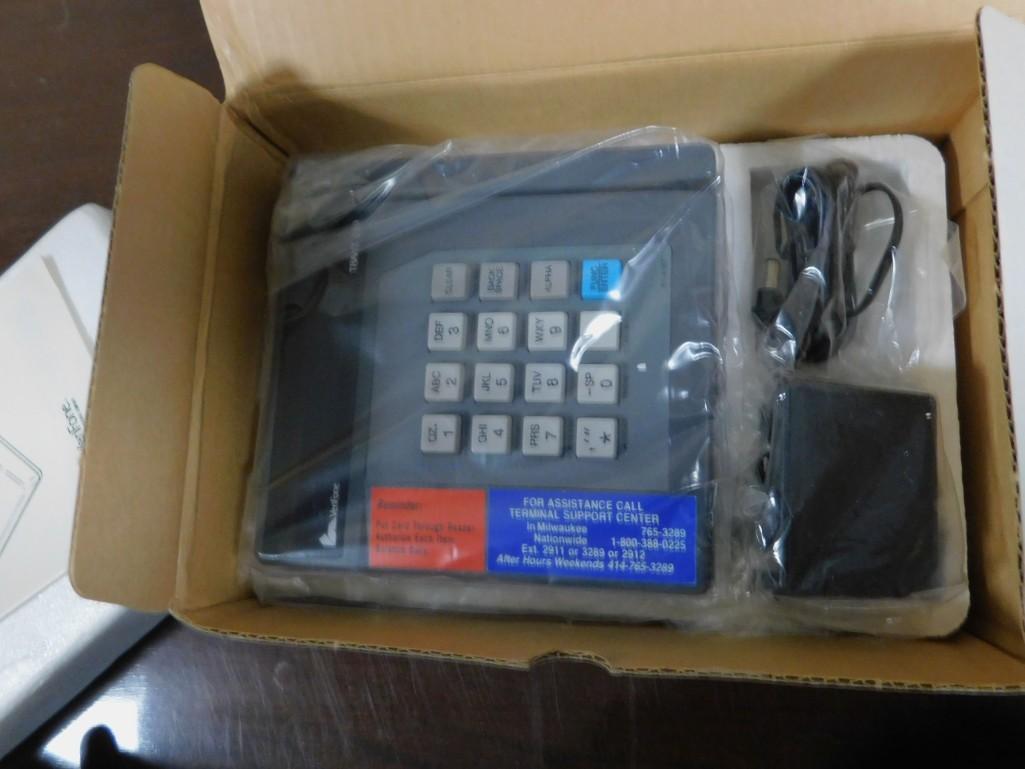 Veriphone Tranz 330 Credit Card Machine, New: Veriphone Tranz 330 Credit Card Machine, New Because of the current covid 19 situation, pick up times are by appointment only. Pick up for this auction will be Feb 27 and 28 during the auction or Mond