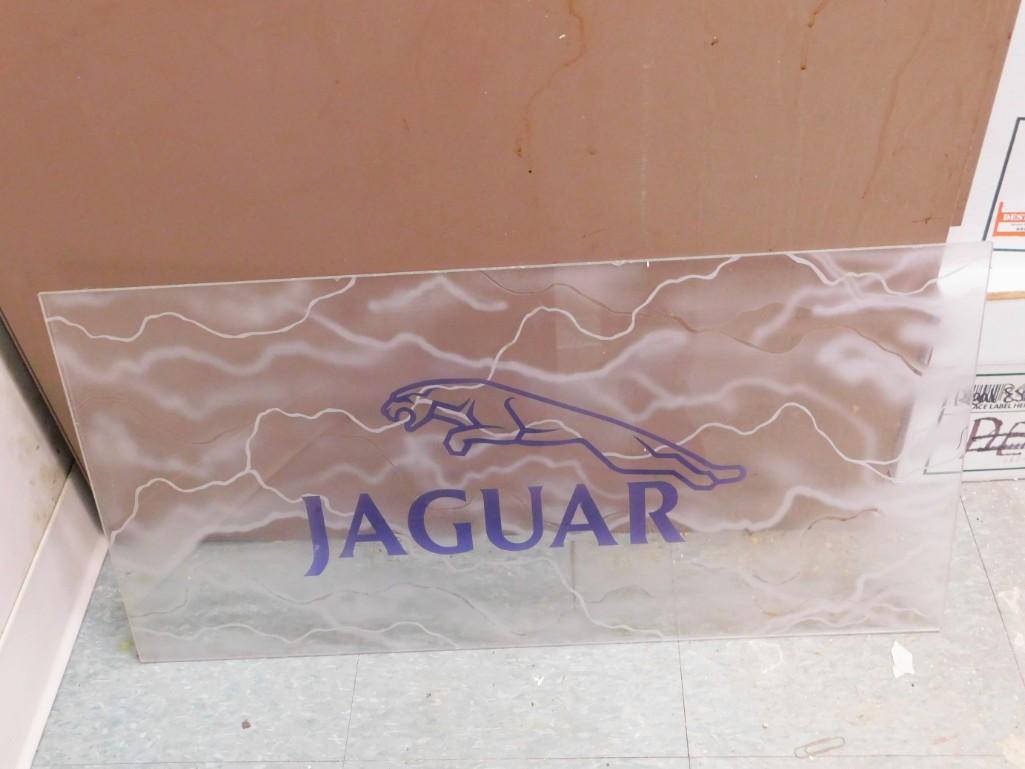 Translucent Plexiglass Jaguar Sign: Translucent Plexiglass Jaguar Advertising Sign Because of the current covid 19 situation, pick up times are by appointment only. Pick up for this auction will be Feb 27 and 28 during the auction or Mo