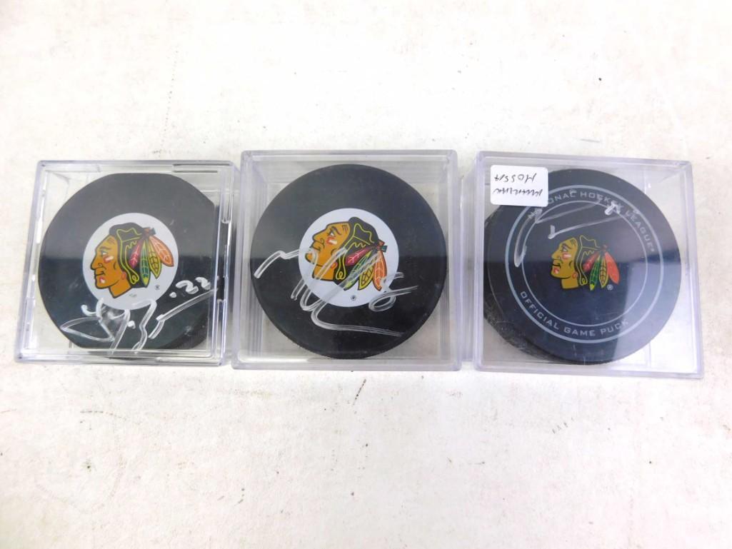 Lot of 3 Signed Hockey Pucks: Lot of 3 Signed Hockey Pucks Troy Brouwer, Matt Walker and Marian Hossa