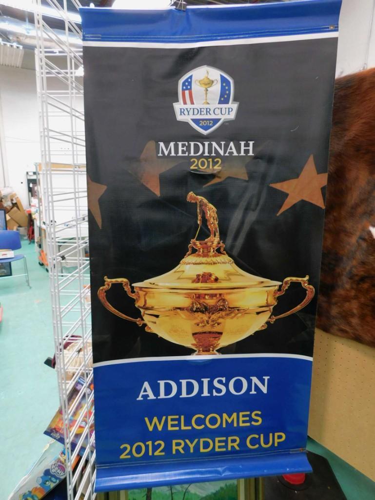 Ryder Cup 2012 Medinah Country Club Advertising Display: Ryder Cup 2012 Medinah Country Club Advertising Display - Roughly 58" x 29". There are two holes in the plastic where some sort of poles probably went to hold it up