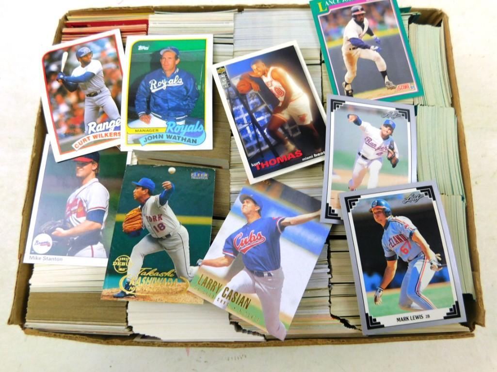 Box Flat full of Sports cards: Box Flat full of Sports cards - Label says Topps, Fleer, Donruss, Score, stars, rookie cards. Appears to be baseball. Accuracy of the label has not been check, but it seems right. Weighs over 9 pounds