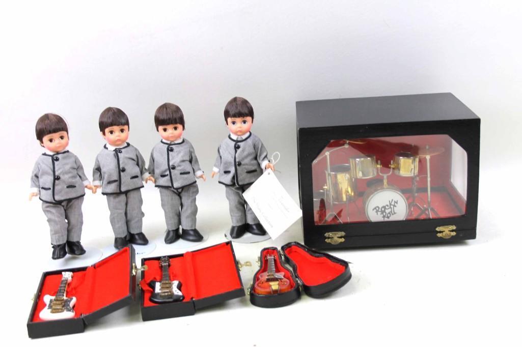 1997 Madame Alexander Rock N Roll Beatles Dolls Set: 1997 Madame Alexander Rock N Roll Beatles Dolls Set with Instruments , Includes 4 dolls , drum set , 3 guitars with cases . One doll has replaced shoes . Snare drum fell off of the base but is include