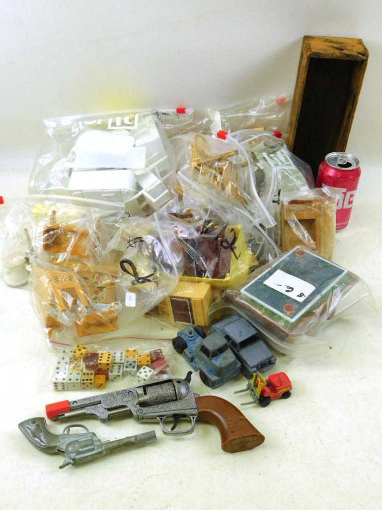 Toy lot including Vintage Cap Guns, Dice, Cars, doll: Toy lot including Vintage Cap Guns, Dice, Cars, doll Furniture, mini fork lift, etc.