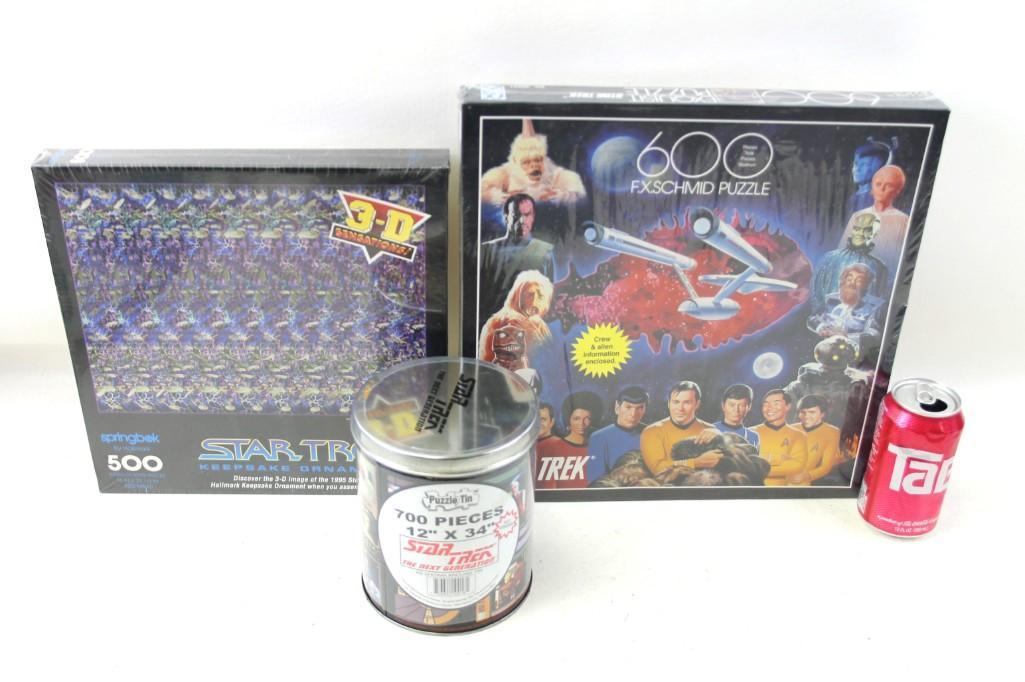 Lot of 3 Star Trek Puzzles Sealed: Lot of 3 Star Trek Puzzles Sealed. 500 pieces, 600 pieces and 700 pieces, for a grand total of 1800 pieces (although we didn't count them because they are sealed)